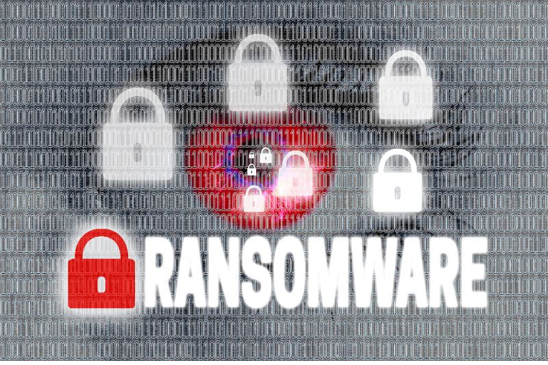 Illustrazione che rappresenta un attacco ransomware con dati cifrati e lucchetti digitali. Illustrazione che rappresenta un attacco ransomware con dati cifrati e lucchetti digitali.